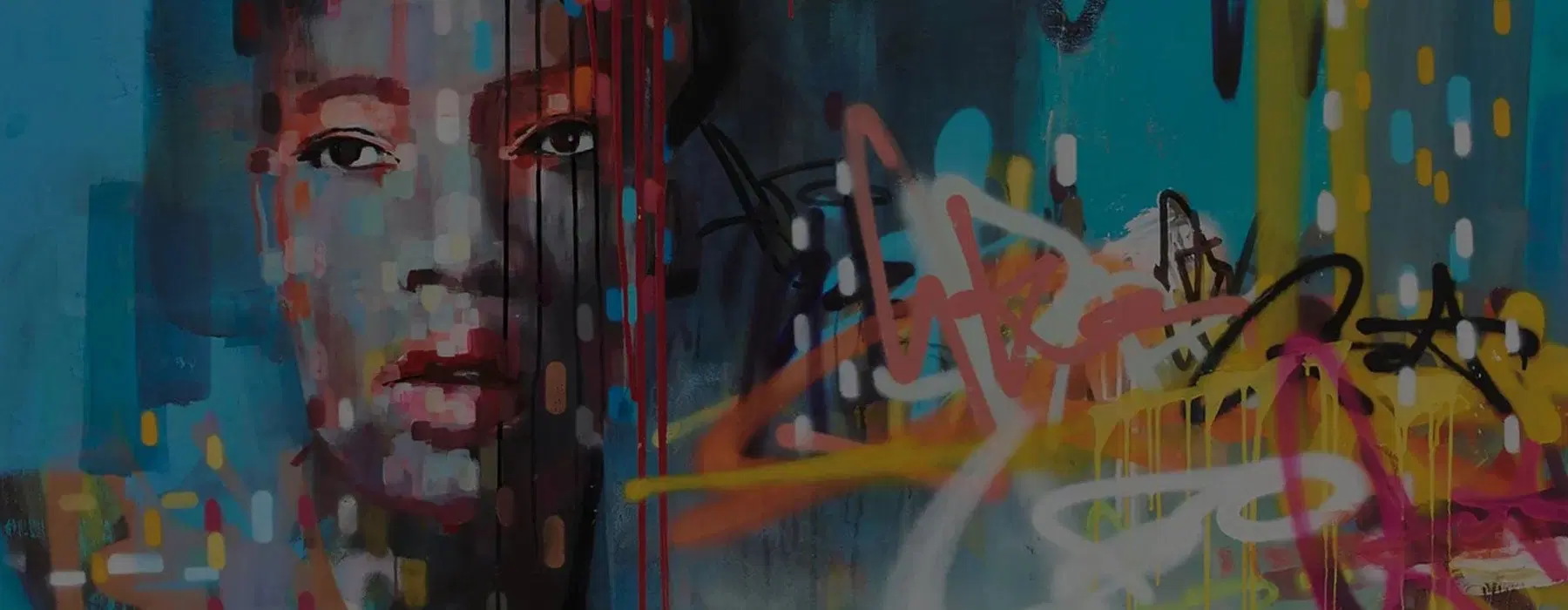 A face with colorful art around it